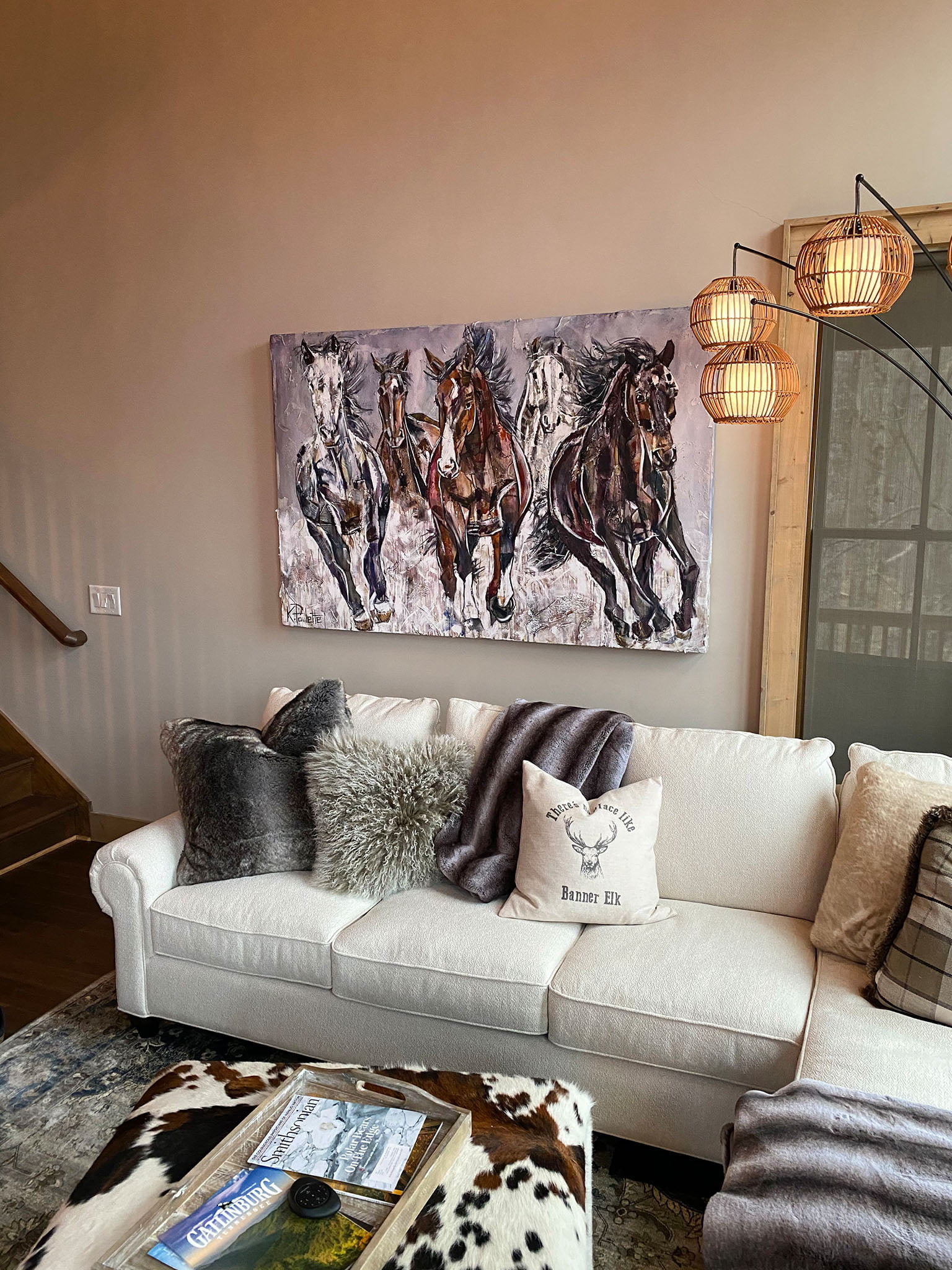 Banner Elk, NC art in a home at Eagles Nest. This horse painting is by Kent Paulette. This photo showcases interior design.