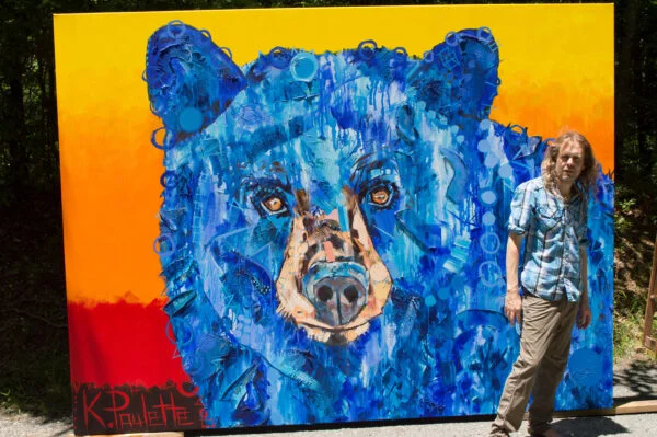Grandfather Mountain Bear painting with artist Kent Paulette at the Nature Museum. K. Paulette stands with his bear art at The Wilson Center for Nature Discovery at Grandfather Mountain.